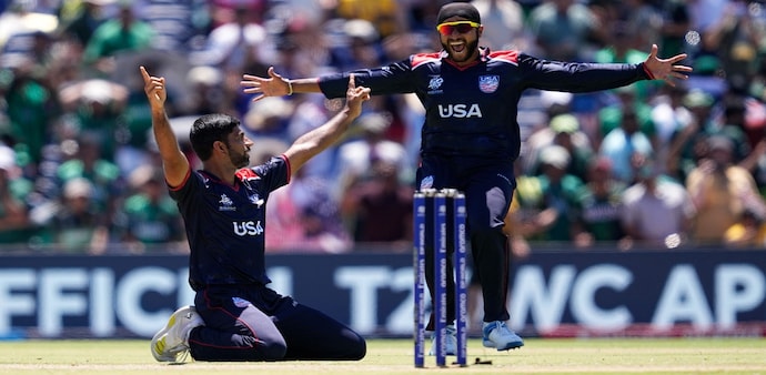 United States' Saurabh Nethralvakar, left, and Harmeet Singh celebrate after their win in the ICC Men's T20 World Cup cricket match against Pakistan at the Grand Prairie Stadium in Grand Prairie, Texas, Thursday, June 6, 2024. (AP Photo/Tony Gutierrez) United States' Saurabh Nethralvakar, left, and Harmeet Singh celebrate after their win in the ICC Men's T20 World Cup cricket match against Pakistan at the Grand Prairie Stadium in Grand Prairie, Texas, Thursday, June 6, 2024. (AP Photo/Tony Gutierrez)