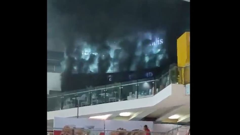 The blaze, which reportedly began around 1 pm, has engulfed several floors of the building, sending plumes of thick black smoke billowing into the sky. The blaze, which reportedly began around 1 pm, has engulfed several floors of the building, sending plumes of thick black smoke billowing into the sky.