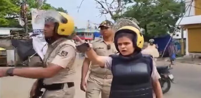 The conflict began when a group staged a sit-in protest against the blood of the animal sacrificed on the road. (Photo: X/ANI) The conflict began when a group staged a sit-in protest against the blood of the animal sacrificed on the road. (Photo: X/ANI)