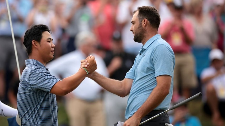 Korea’s Joohyung Kim (left) congratulates world number one Scottie Scheffler on his playoff win in the Travellers Championship at TPC Rover Highlands on Sunday. Image courtesy Korea’s Joohyung Kim (left) congratulates world number one Scottie Scheffler on his playoff win in the Travellers Championship at TPC Rover Highlands on Sunday. Image courtesy
