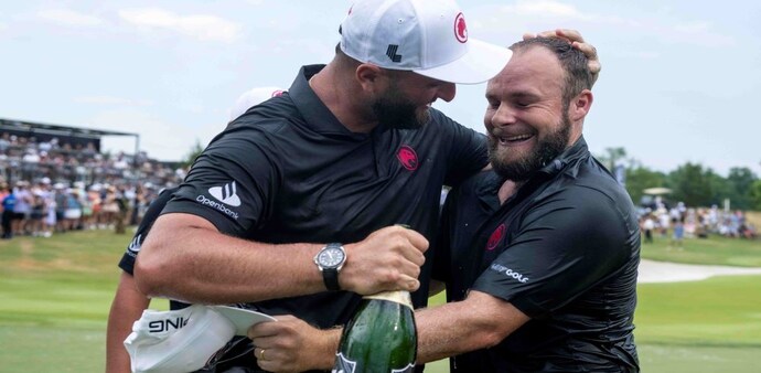 Legion XIII captain Jon Rahm congratulates individual winner and team mate Tyrrell Hatton at Nashville on Sunday. Image courtesy livgolf.com. Legion XIII captain Jon Rahm congratulates individual winner and team mate Tyrrell Hatton at Nashville on Sunday. Image courtesy livgolf.com.