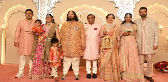 Anant, the youngest son of industrialist Mukesh Ambani, tied the knot with Radhika on Friday Anant, the youngest son of industrialist Mukesh Ambani, tied the knot with Radhika on Friday