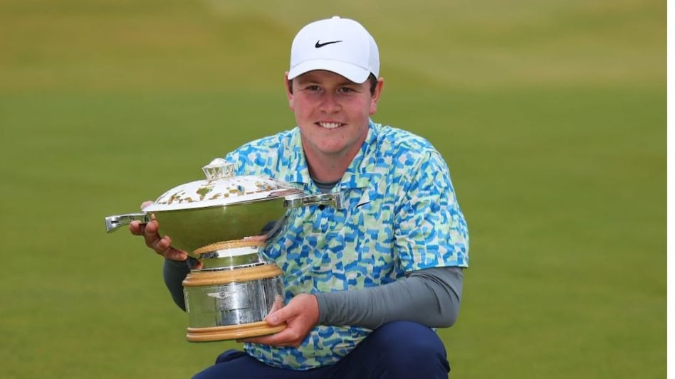Robert MacIntyre of Scotland with his Scottish Open trophy which he won by stroke at The Renaissance Club on Sunday. Image courtesy DP World Tour/X. Robert MacIntyre of Scotland with his Scottish Open trophy which he won by stroke at The Renaissance Club on Sunday. Image courtesy DP World Tour/X.
