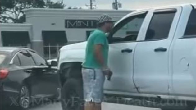 Mobile phone video recorded by another driver at the scene shows the victim getting out of his car at the intersection and yelling at the driver of a pickup truck. (Image: @ManyFaces_Death/X) Mobile phone video recorded by another driver at the scene shows the victim getting out of his car at the intersection and yelling at the driver of a pickup truck. (Image: @ManyFaces_Death/X)
