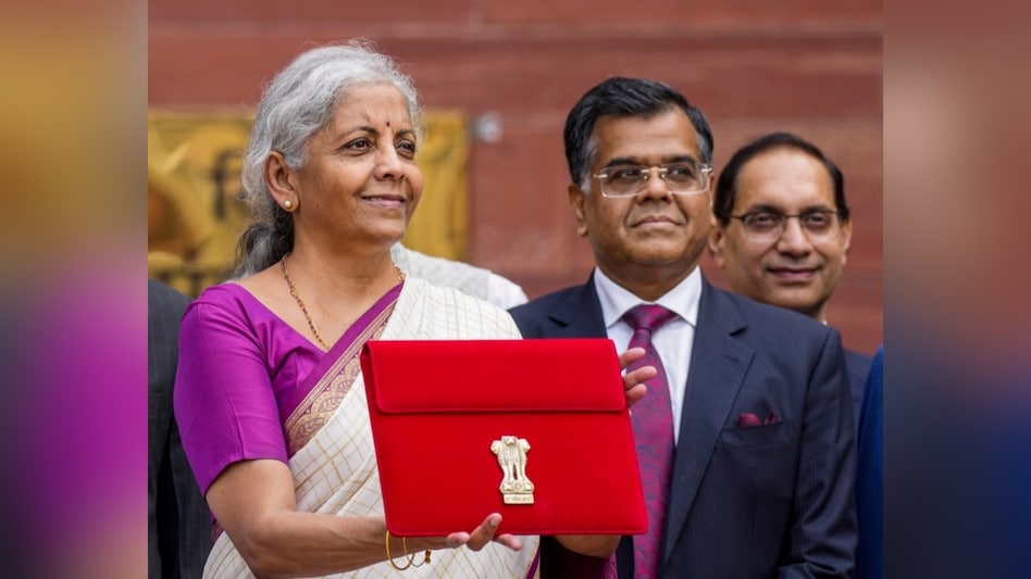 Union Finance Minister Nirmala Sitharaman along with Finance Secretary TV Somanathan displays a red pouch carrying the Budget documents. (Photo: PTI) Union Finance Minister Nirmala Sitharaman along with Finance Secretary TV Somanathan displays a red pouch carrying the Budget documents. (Photo: PTI)