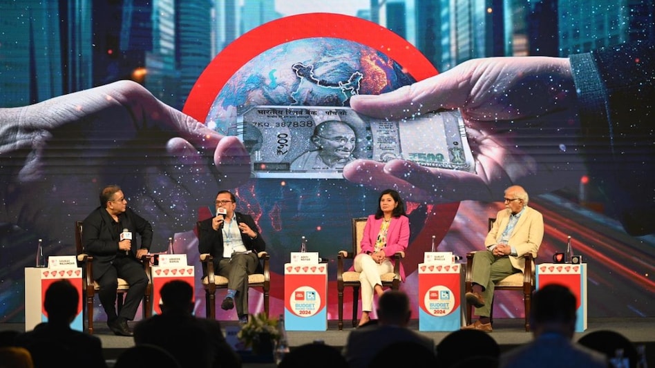 Dr. Surjit Bhalla, Abheek Barua, and Aditi Nayar with Business Today Editor Sourav Majumdar at India Today-Business Today Budget Round Table 2024 Dr. Surjit Bhalla, Abheek Barua, and Aditi Nayar with Business Today Editor Sourav Majumdar at India Today-Business Today Budget Round Table 2024