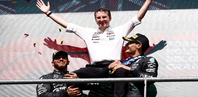 Formula One F1 - Belgian Grand Prix - Circuit de Spa-Francorchamps, Stavelot, Belgium - July 28, 2024 Mercedes' George Russell celebrates with the trophy on the podium along with Mercedes' Lewis Hamilton REUTERS/Johanna Geron Formula One F1 - Belgian Grand Prix - Circuit de Spa-Francorchamps, Stavelot, Belgium - July 28, 2024 Mercedes' George Russell celebrates with the trophy on the podium along with Mercedes' Lewis Hamilton REUTERS/Johanna Geron