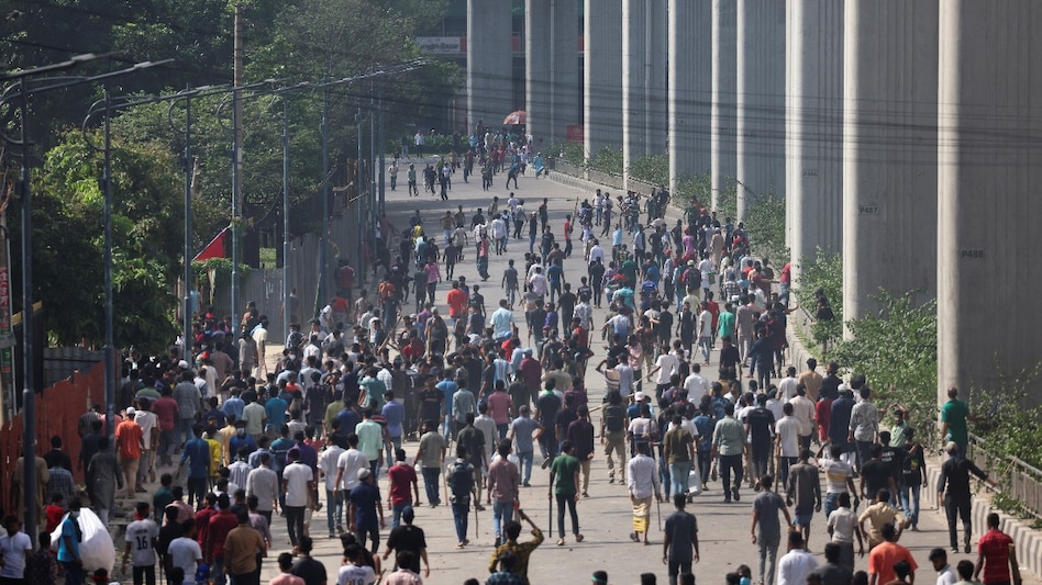 The protestors are demanding Bangladesh Prime Minister Sheikh Hasina's resignation over a job quota system. The protestors are demanding Bangladesh Prime Minister Sheikh Hasina's resignation over a job quota system.