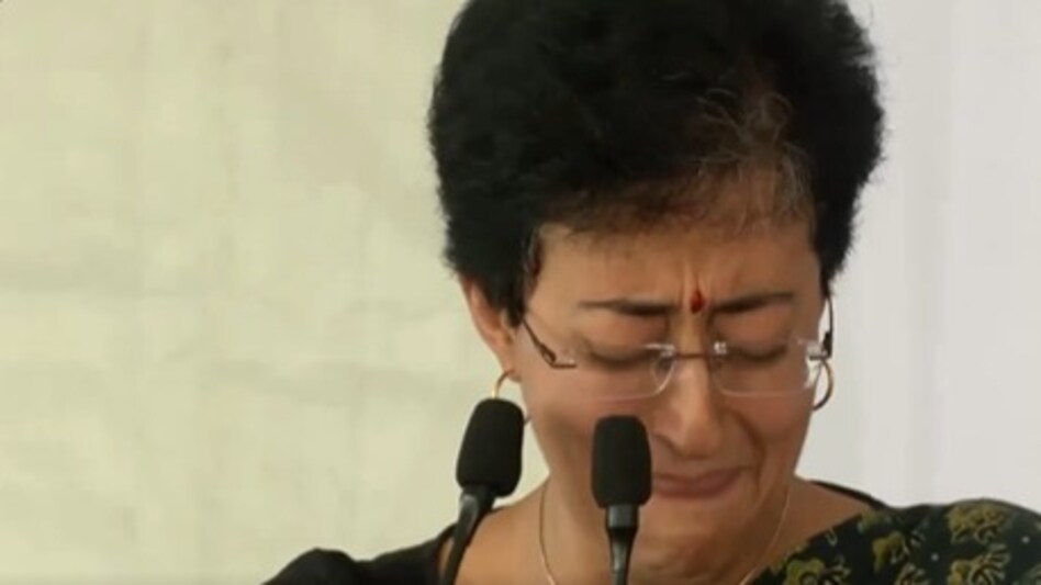 Addressing a gathering of AAP workers, Aatishi welcomed the decision and in a broken voice called Sisodia as 'the man who brought in a revolution in education' Addressing a gathering of AAP workers, Aatishi welcomed the decision and in a broken voice called Sisodia as 'the man who brought in a revolution in education'