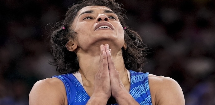 Despite desperate last-minute attempts, including cutting her hair, Phogat could not meet the weight requirement during the morning weigh-in. Despite desperate last-minute attempts, including cutting her hair, Phogat could not meet the weight requirement during the morning weigh-in.