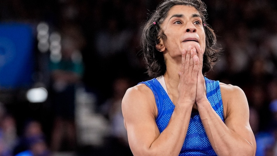 Disheartened by her disqualification over weight issues, Vinesh Phogat announced her retirement from wrestling Disheartened by her disqualification over weight issues, Vinesh Phogat announced her retirement from wrestling