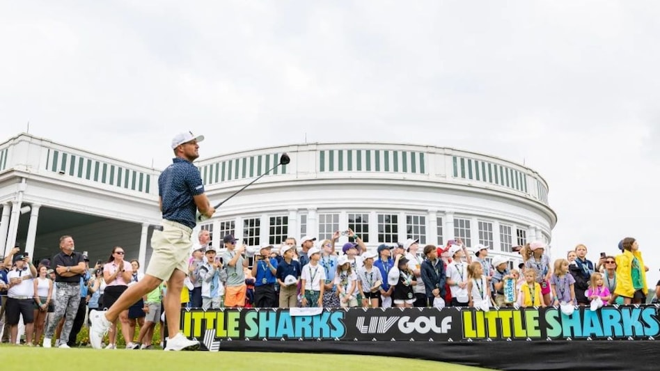 Crushers GC captain Bryson DeChambeau tees off outside the colonial style clubhouse on day one of LIV Golf Greenbrier on Friday. Image courtesy livgolf.com. Crushers GC captain Bryson DeChambeau tees off outside the colonial style clubhouse on day one of LIV Golf Greenbrier on Friday. Image courtesy livgolf.com.