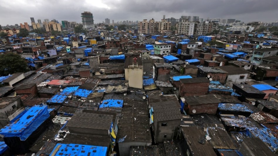 The Dharavi slum redevelopment project, valued in crores, will involve the transfer of land not to the Adani group, but to various Maharashtra government departments. The Dharavi slum redevelopment project, valued in crores, will involve the transfer of land not to the Adani group, but to various Maharashtra government departments.