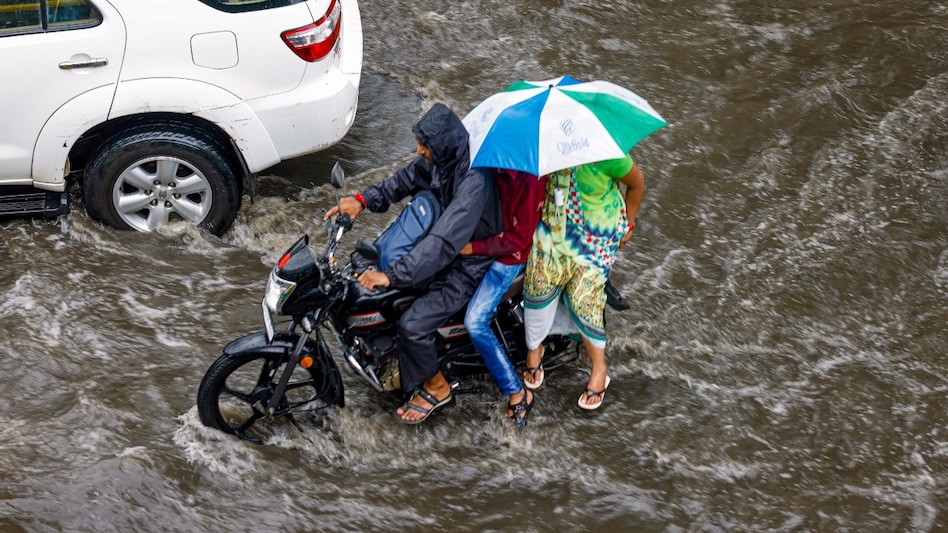 The intense rainfall has already caused severe waterlogging in low-lying areas, displacing hundreds of people. The intense rainfall has already caused severe waterlogging in low-lying areas, displacing hundreds of people.