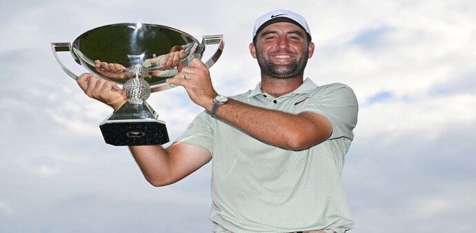 World number one Scottie Scheffler with his Tour Championship trophy at East Lake Golf Club in Atlanta on Sunday. Image courtesy PGA Tour/Getty Images. World number one Scottie Scheffler with his Tour Championship trophy at East Lake Golf Club in Atlanta on Sunday. Image courtesy PGA Tour/Getty Images.