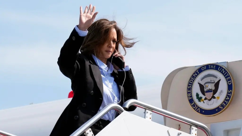As reported by various news outlets, Harris was seen holding her cellphone and wearing headphones in order to sidestep questions from the press. As reported by various news outlets, Harris was seen holding her cellphone and wearing headphones in order to sidestep questions from the press.