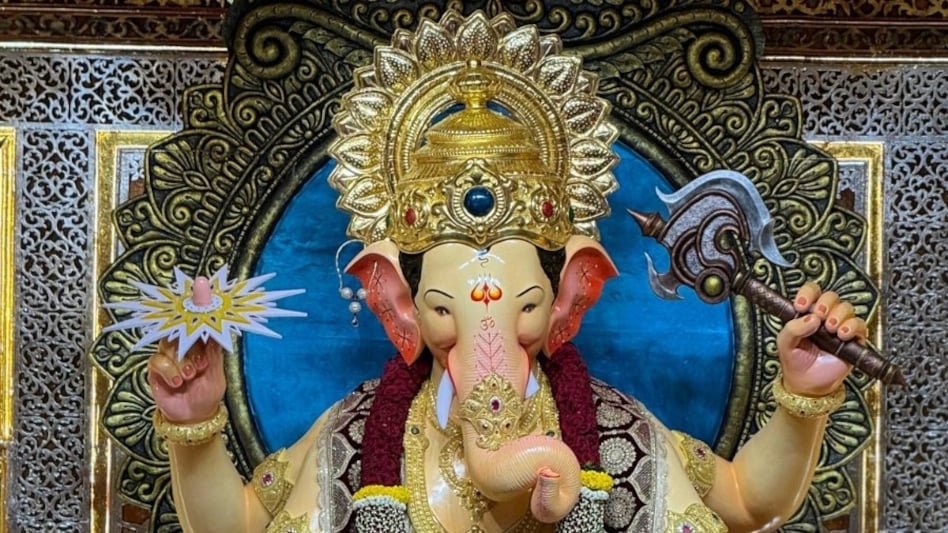 The unveiling of Lalbaugcha Raja ahead of the festival has already attracted significant attention, with the idol dressed in maroon attire and adorned with intricate jewelry, including Ambani’s gold crown. The unveiling of Lalbaugcha Raja ahead of the festival has already attracted significant attention, with the idol dressed in maroon attire and adorned with intricate jewelry, including Ambani’s gold crown.