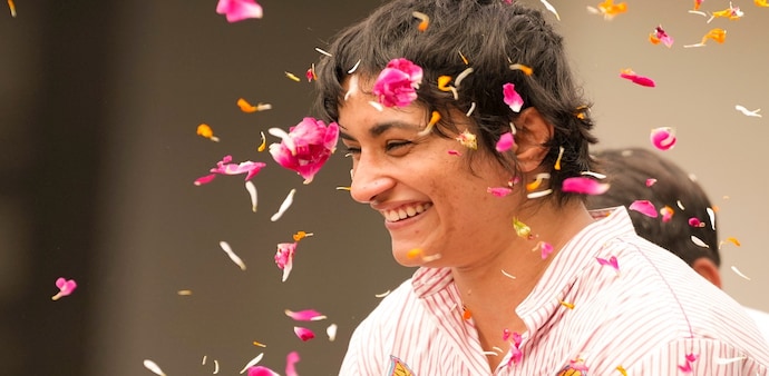 Wrestler and Olympian Vinesh Phogat, who joined the Congress today along with fellow wrestler Bajrang Punia, came down strongly against the BJP, especially about its treatment of wrestlers. Wrestler and Olympian Vinesh Phogat, who joined the Congress today along with fellow wrestler Bajrang Punia, came down strongly against the BJP, especially about its treatment of wrestlers.