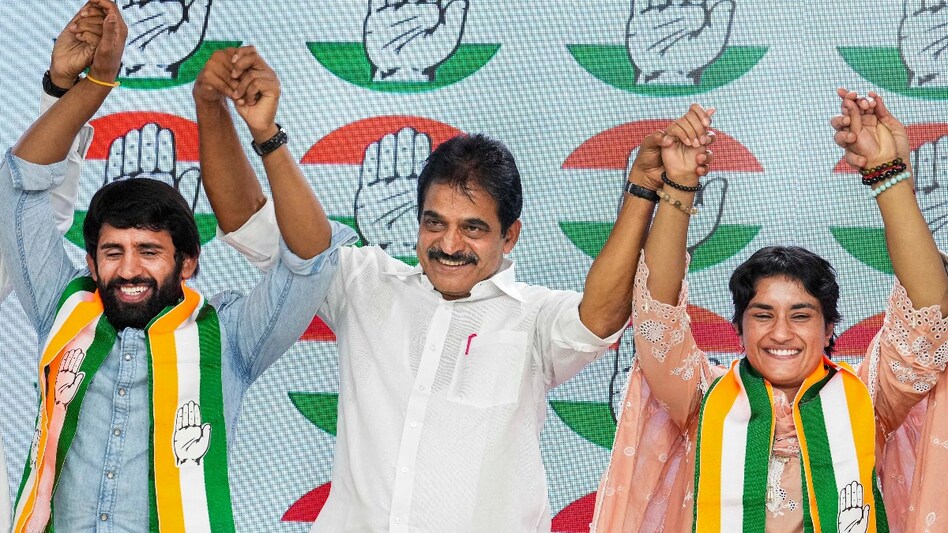 After days of speculation, Punia and his fellow wrestler and Olympian, Vinesh Phogat formally joined the Congress party earlier today. After days of speculation, Punia and his fellow wrestler and Olympian, Vinesh Phogat formally joined the Congress party earlier today.