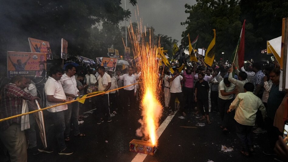 Firecrackers were burst outside the CM’s residence after his release from the Tihar Jail on September 13 evening. AAP workers had gathered to welcome their leader. Firecrackers were burst outside the CM’s residence after his release from the Tihar Jail on September 13 evening. AAP workers had gathered to welcome their leader.