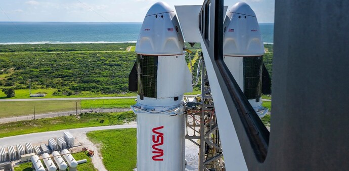 SpaceX’s Falcon 9 rocket, with the Dragon spacecraft atop, is vertical at the launch pad of Space Launch Complex-40 at Cape Canaveral Space Force Station in Florida SpaceX’s Falcon 9 rocket, with the Dragon spacecraft atop, is vertical at the launch pad of Space Launch Complex-40 at Cape Canaveral Space Force Station in Florida