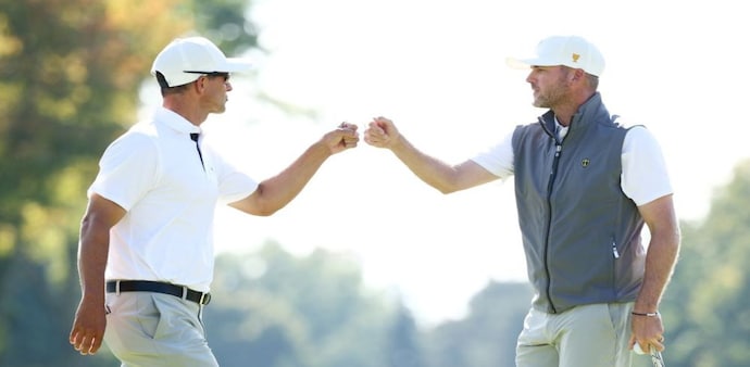 Adam Scott and Taylor Pendrith celebrate a point during Saturday’s four ball session against the US in Montreal, Image courtesy PGA Tour/Getty Images. Adam Scott and Taylor Pendrith celebrate a point during Saturday’s four ball session against the US in Montreal, Image courtesy PGA Tour/Getty Images.