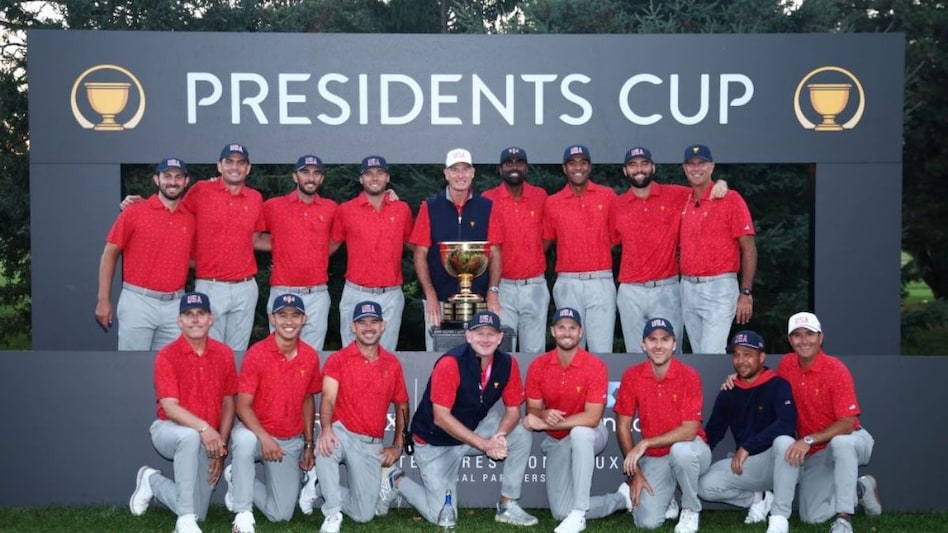 Members of the victorious US team with the Presidents Cup at Royal Montreal Golf Club on Sunday. Image courtesy PGA Tour/Getty Images. Members of the victorious US team with the Presidents Cup at Royal Montreal Golf Club on Sunday. Image courtesy PGA Tour/Getty Images.