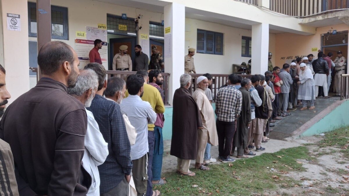 People stand in queue to vote in the third phase of Jammu and Kashmir polls People stand in queue to vote in the third phase of Jammu and Kashmir polls