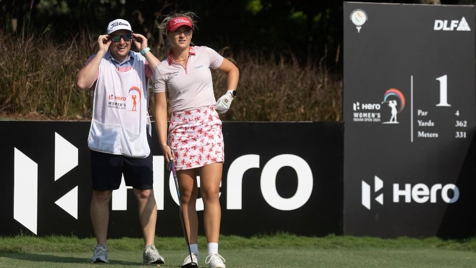 Hero Women’s Indian Open day one leader Sara Kouskova of the Czech Republic discusses a shot with her caddie at the DLF Golf and Country Club in Gurgaon on Thursday. Image courtesy LET. Hero Women’s Indian Open day one leader Sara Kouskova of the Czech Republic discusses a shot with her caddie at the DLF Golf and Country Club in Gurgaon on Thursday. Image courtesy LET.