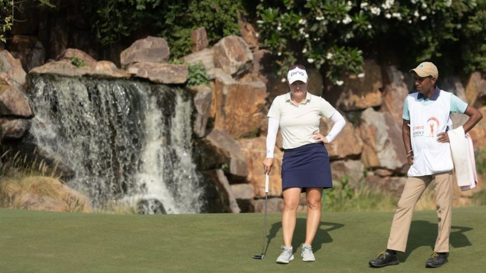 Day three co-leader of the Hero Women’s Indian Open, Manon De Roey of Belgium, studies her putt on hole 17 of the DLF course in Gurgaon on Saturday. Image courtesy LET. Day three co-leader of the Hero Women’s Indian Open, Manon De Roey of Belgium, studies her putt on hole 17 of the DLF course in Gurgaon on Saturday. Image courtesy LET.