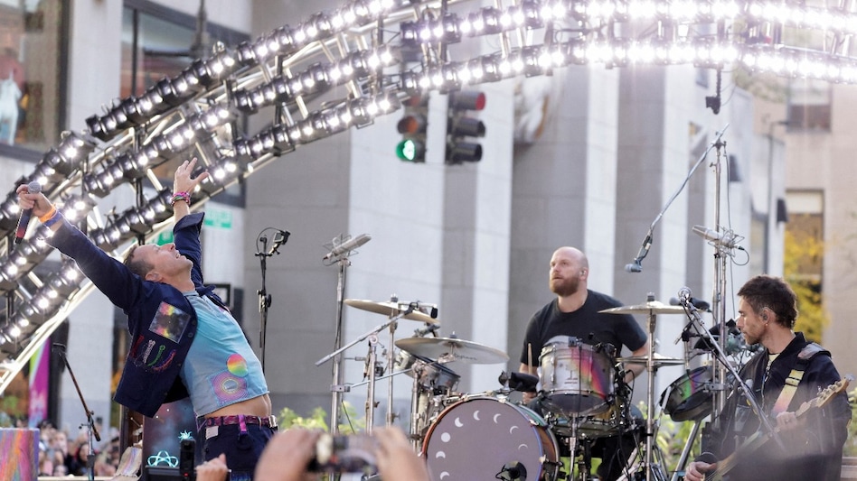 Chris Martin gestures on stage as Coldplay performs on NBC's 'Today' show at Rockefeller Plaza in New York City, US Chris Martin gestures on stage as Coldplay performs on NBC's 'Today' show at Rockefeller Plaza in New York City, US