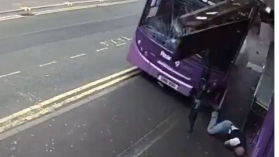 Simon Smith was walking down Gun Street in Reading, UK, when a bus suddenly hit him from behind, pushing him several meters along the sidewalk. Simon Smith was walking down Gun Street in Reading, UK, when a bus suddenly hit him from behind, pushing him several meters along the sidewalk.