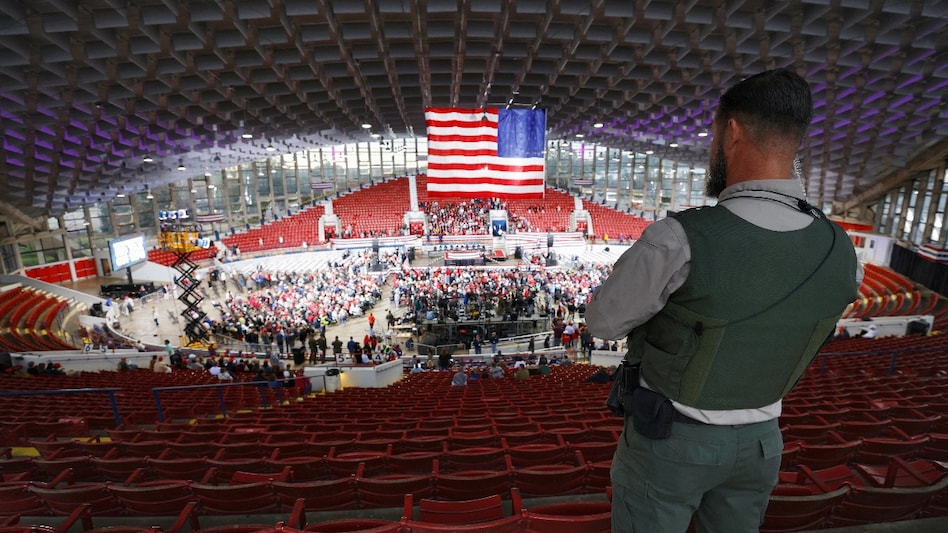 A policeman keeps watch inside Dorton Arena before a rally by Republican presidential nominee Donald Trump in North Carolina on November 4. A policeman keeps watch inside Dorton Arena before a rally by Republican presidential nominee Donald Trump in North Carolina on November 4.