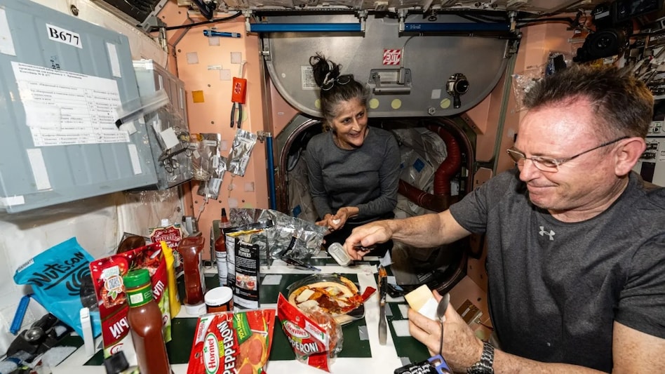 Williams and Wilmore, make dinner in the station’s galley on September 9, 2024. (Photo: NASA) Williams and Wilmore, make dinner in the station’s galley on September 9, 2024. (Photo: NASA)