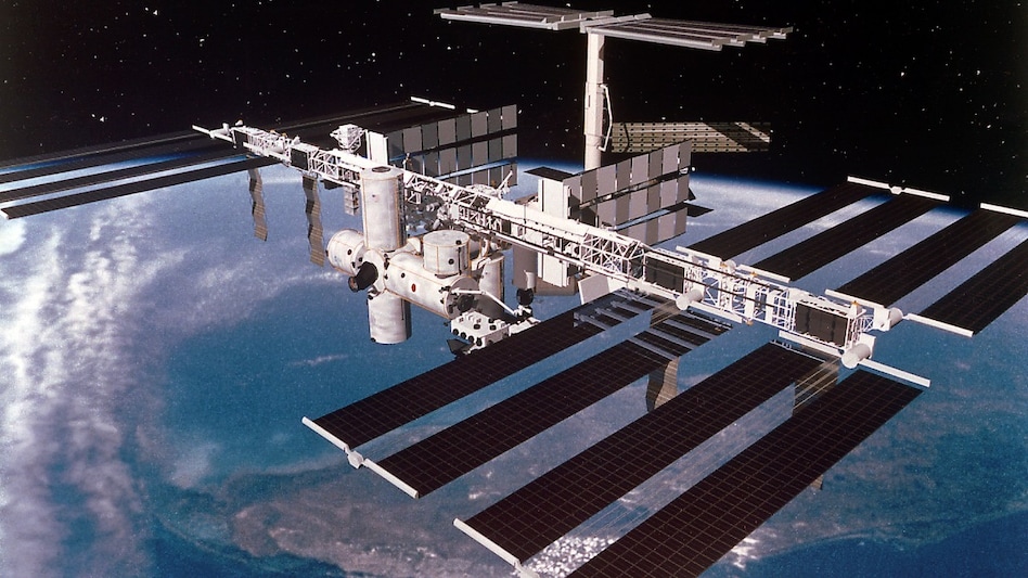 The ISS is in low Earth orbit, roughly 250 miles (400 km) above our planet. The ISS is in low Earth orbit, roughly 250 miles (400 km) above our planet.