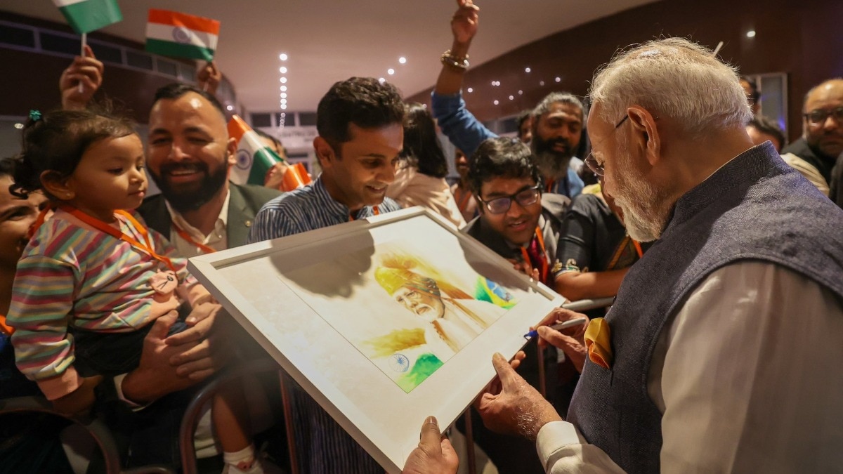 The PM was warmly welcomed by members of the Indian community in Brazil with Sanskrit chants. (Photo: @narendramodi) The PM was warmly welcomed by members of the Indian community in Brazil with Sanskrit chants. (Photo: @narendramodi)