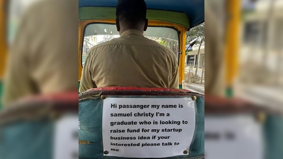 Samuel Christy, an auto driver and graduate, has gone viral after a passenger posted a photo of his creative poster on Reddit. Samuel Christy, an auto driver and graduate, has gone viral after a passenger posted a photo of his creative poster on Reddit.