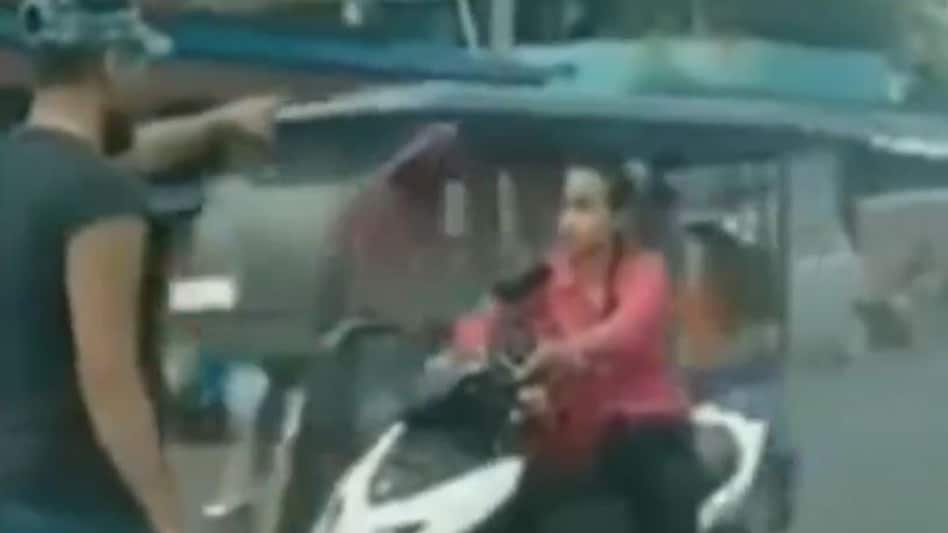 In the video, the man can be seen demanding his scooter back, which he had gifted to his girlfriend. He accuses the couple of infidelity and publicly shames them. In the video, the man can be seen demanding his scooter back, which he had gifted to his girlfriend. He accuses the couple of infidelity and publicly shames them.