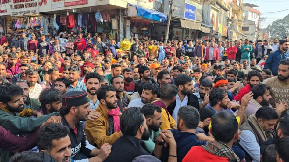 Footage shared by news agency ANI showed protesters pelting stones at security personnel and vandalizing a CRPF vehicle, escalating the situation further. Footage shared by news agency ANI showed protesters pelting stones at security personnel and vandalizing a CRPF vehicle, escalating the situation further.