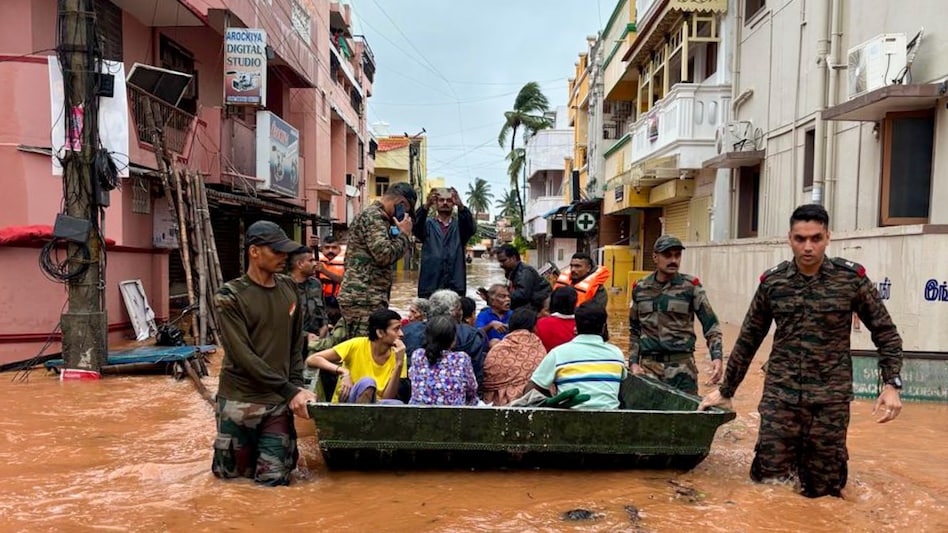 Indian Army personnel rescue people from a flooded area in the aftermath of landfall of Cyclone Fengal, in Puducherry, on December 1. Indian Army personnel rescue people from a flooded area in the aftermath of landfall of Cyclone Fengal, in Puducherry, on December 1.