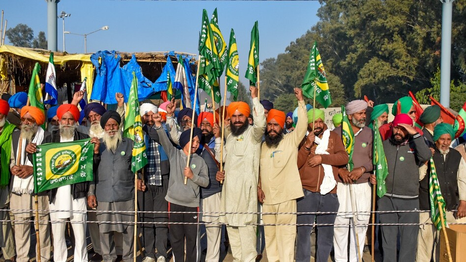 Farmers gather at Shambhu border before the commencement of their ‘Delhi Chalo’ march towards the national capital in Patiala district, Punjab, on December 6. Farmers gather at Shambhu border before the commencement of their ‘Delhi Chalo’ march towards the national capital in Patiala district, Punjab, on December 6.