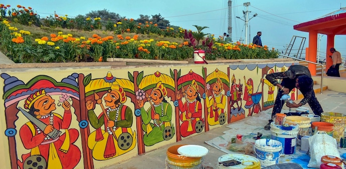 A wall being painted in preparation for upcoming Maha Kumbh Mela 2025 in Prayagraj. A wall being painted in preparation for upcoming Maha Kumbh Mela 2025 in Prayagraj.