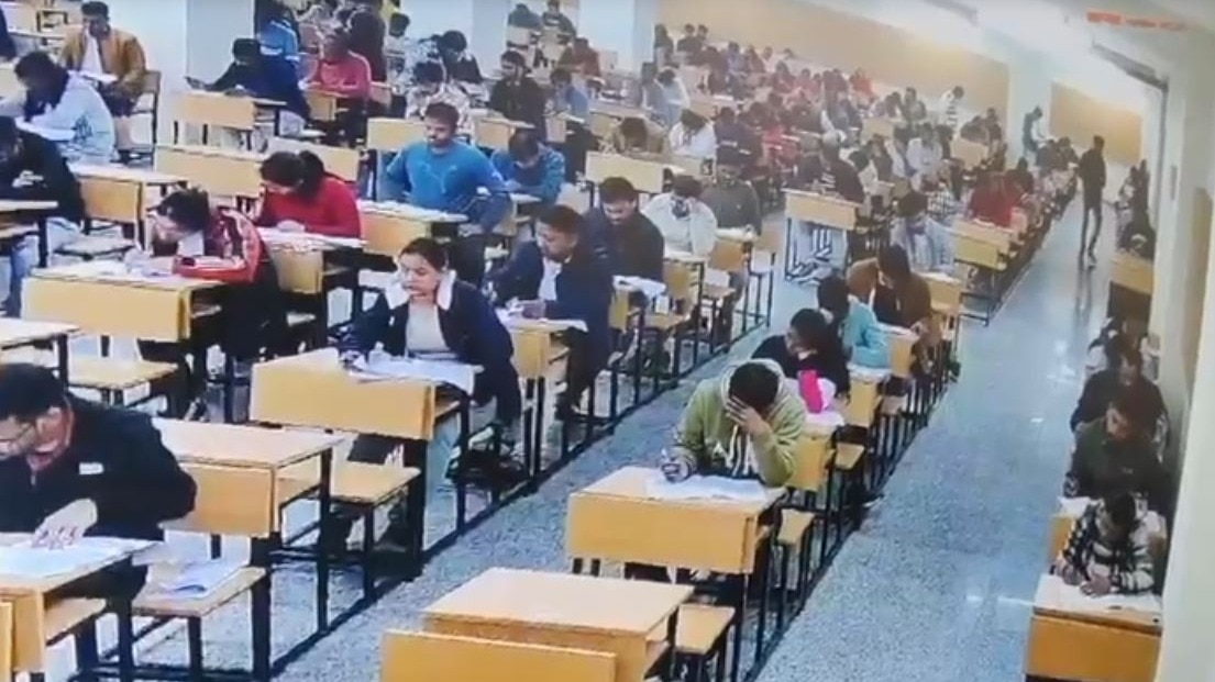 Bihar Exam Chaos: CCTV footage shows candidates running with and tearing question papers
