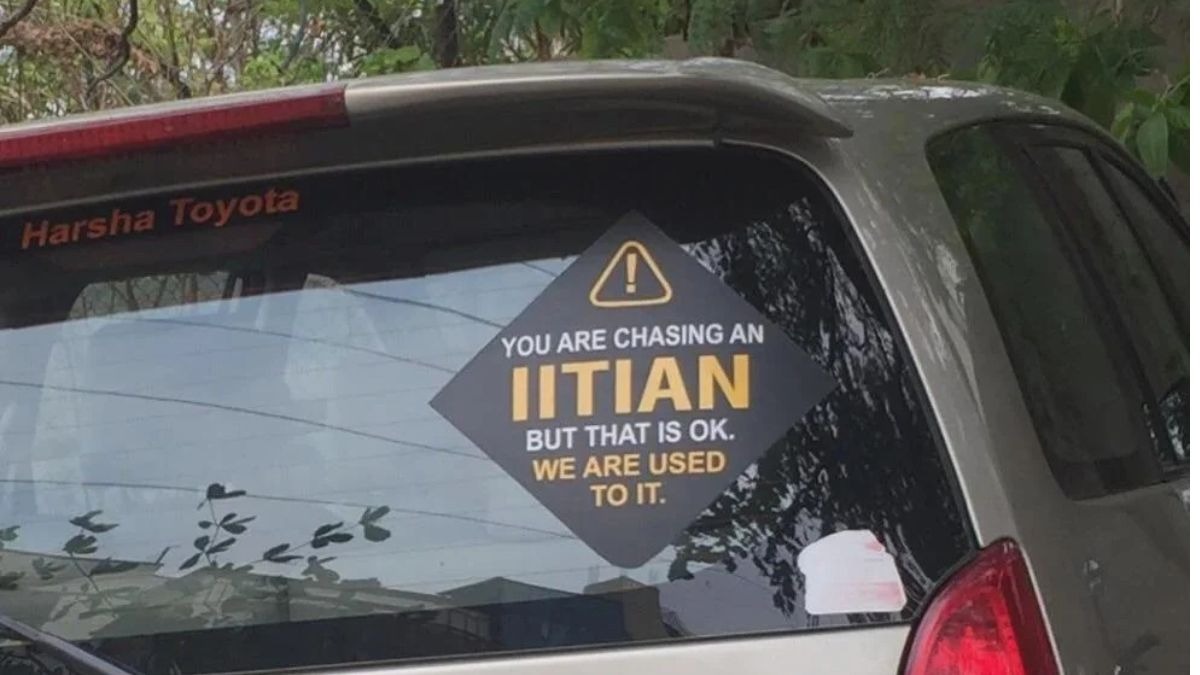 A message aimed at those behind the car read, “You are chasing an IITian but that is ok. We are used to it.” A message aimed at those behind the car read, “You are chasing an IITian but that is ok. We are used to it.”