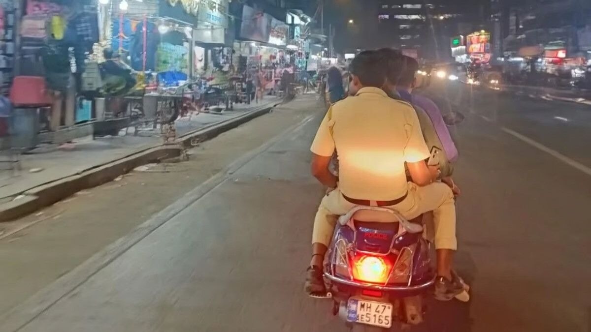 A commuter who witnessed the incident took a photo of the scene, which also showed the vehicle's number plate, "MH47 AE5165," and shared it online. A commuter who witnessed the incident took a photo of the scene, which also showed the vehicle's number plate, "MH47 AE5165," and shared it online.