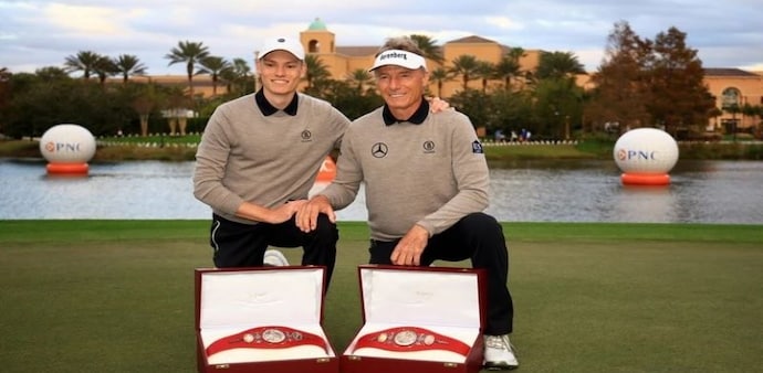 Jason Langer and his legendary father Bernhard with their PNC Championship belts after beating Tiger and Charlie Woods in a playoff at the Ritz-Carlton GC in Orlando, Florida, on Sunday. Image courtesy pncchampionship.com. Jason Langer and his legendary father Bernhard with their PNC Championship belts after beating Tiger and Charlie Woods in a playoff at the Ritz-Carlton GC in Orlando, Florida, on Sunday. Image courtesy pncchampionship.com.
