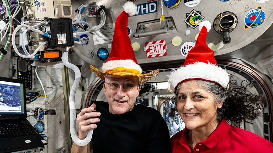 NASA astronauts Don Pettit and Suni Williams pose for a fun holiday season portrait while speaking on a ham radio inside the Columbus laboratory module. (Photo: NASA) NASA astronauts Don Pettit and Suni Williams pose for a fun holiday season portrait while speaking on a ham radio inside the Columbus laboratory module. (Photo: NASA)