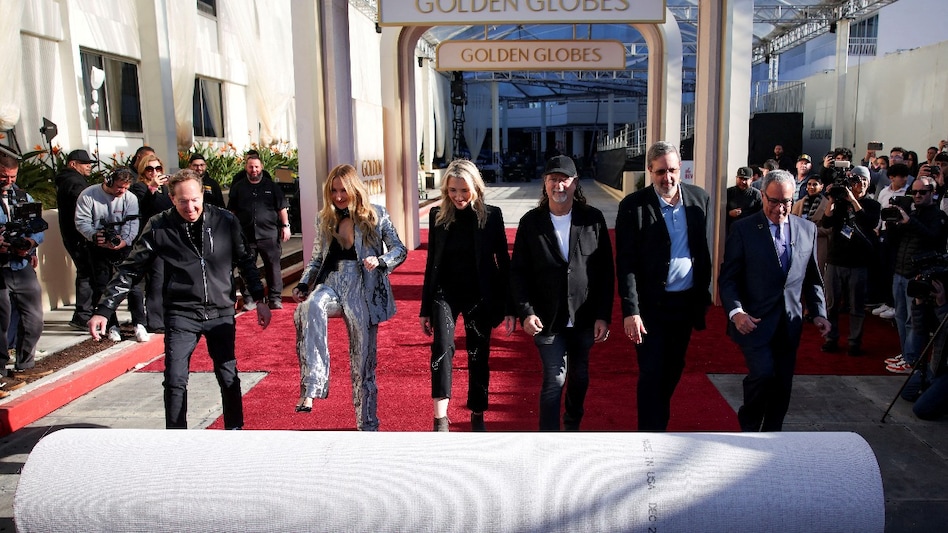 Barry Adelman, Nikki Glaser, President of Golden Globes Helen Hoehne, Glenn Weiss and Ricky Kirshner roll out the red carpet at the Beverly Hilton to kick off Hollywood's award season in Beverly Hills on January 2. Barry Adelman, Nikki Glaser, President of Golden Globes Helen Hoehne, Glenn Weiss and Ricky Kirshner roll out the red carpet at the Beverly Hilton to kick off Hollywood's award season in Beverly Hills on January 2.