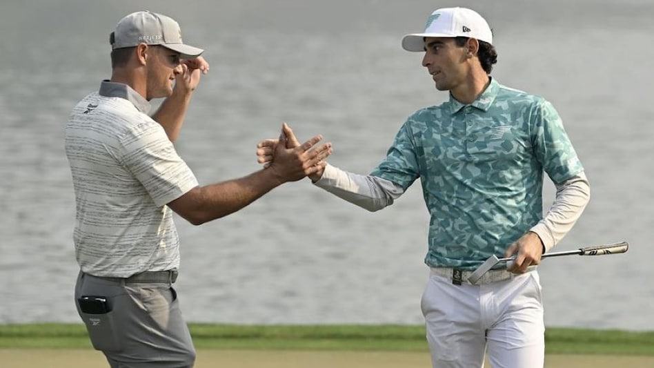Day two leader Joaquin Niemann of Chile shakes hands with fellow LIV Golf captain Bryson DeChambeau after the second round of the International Series India presented by DLF in Gurgaon on Friday. (Image courtesy: Asian Tour) Day two leader Joaquin Niemann of Chile shakes hands with fellow LIV Golf captain Bryson DeChambeau after the second round of the International Series India presented by DLF in Gurgaon on Friday. (Image courtesy: Asian Tour)
