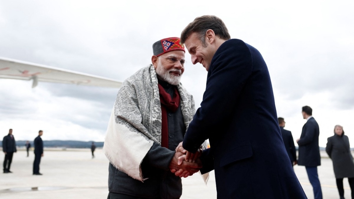 French President Emmanuel Macron shakes hands with Indian Prime Minister Narendra Modi after a departure ceremony at Marseille Provence airport in Marignane. (Reuters) French President Emmanuel Macron shakes hands with Indian Prime Minister Narendra Modi after a departure ceremony at Marseille Provence airport in Marignane. (Reuters)